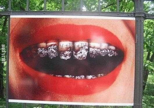 napis, reklama : Palenie zabija
