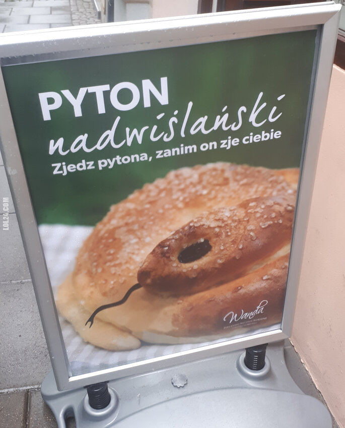 napis, reklama : "Zjedz pytona, zanim on zje ciebie"