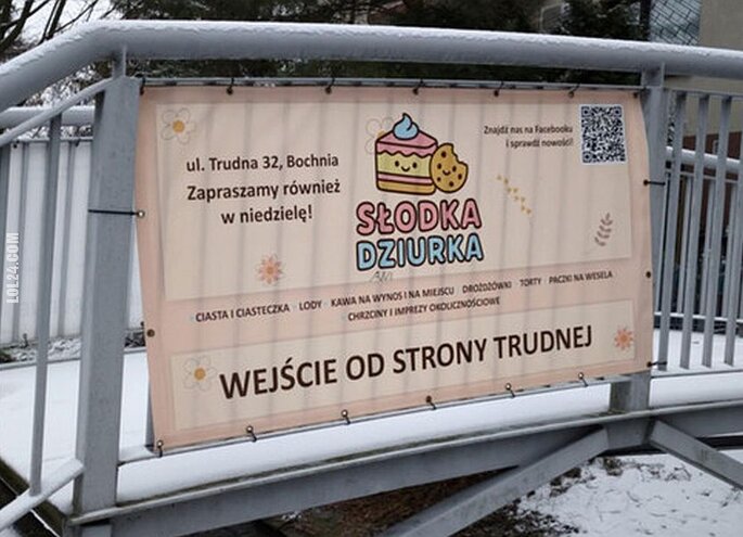 napis, reklama : "Słodka dziurka"