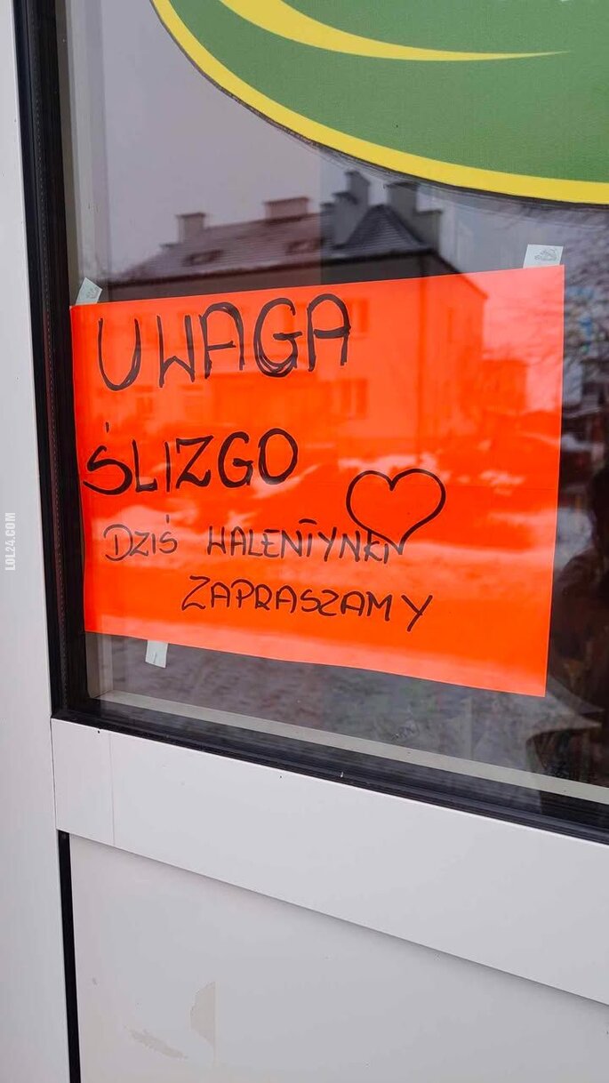 napis, reklama : Ślizgo