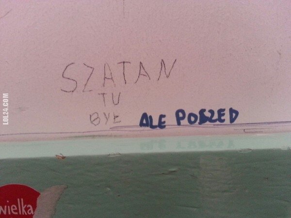napis, reklama : "Szatan tu był. Ale poszed"