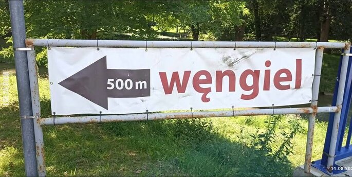 napis, reklama : "Węngiel"