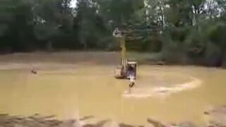 Koparka i narty wodne!