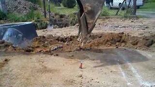 Odpalanie zapalniczki koparką?